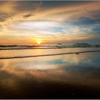 Watch the sunset at Tanjung Aru beach